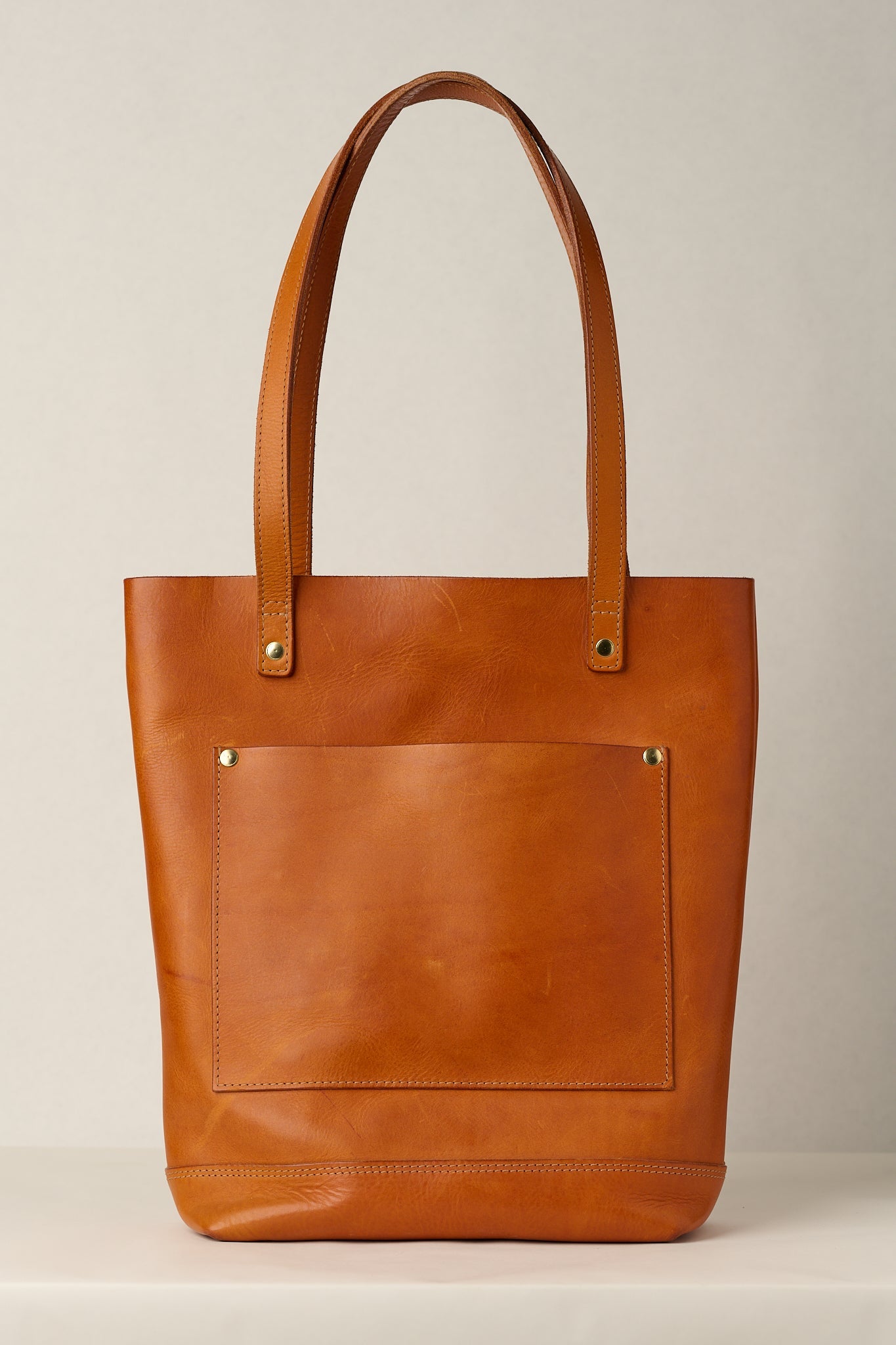 Anya Roux Olmo leather Chapelle tote on white background.