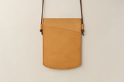 Anya Roux Laverna natural vachetta crossbody pouch.