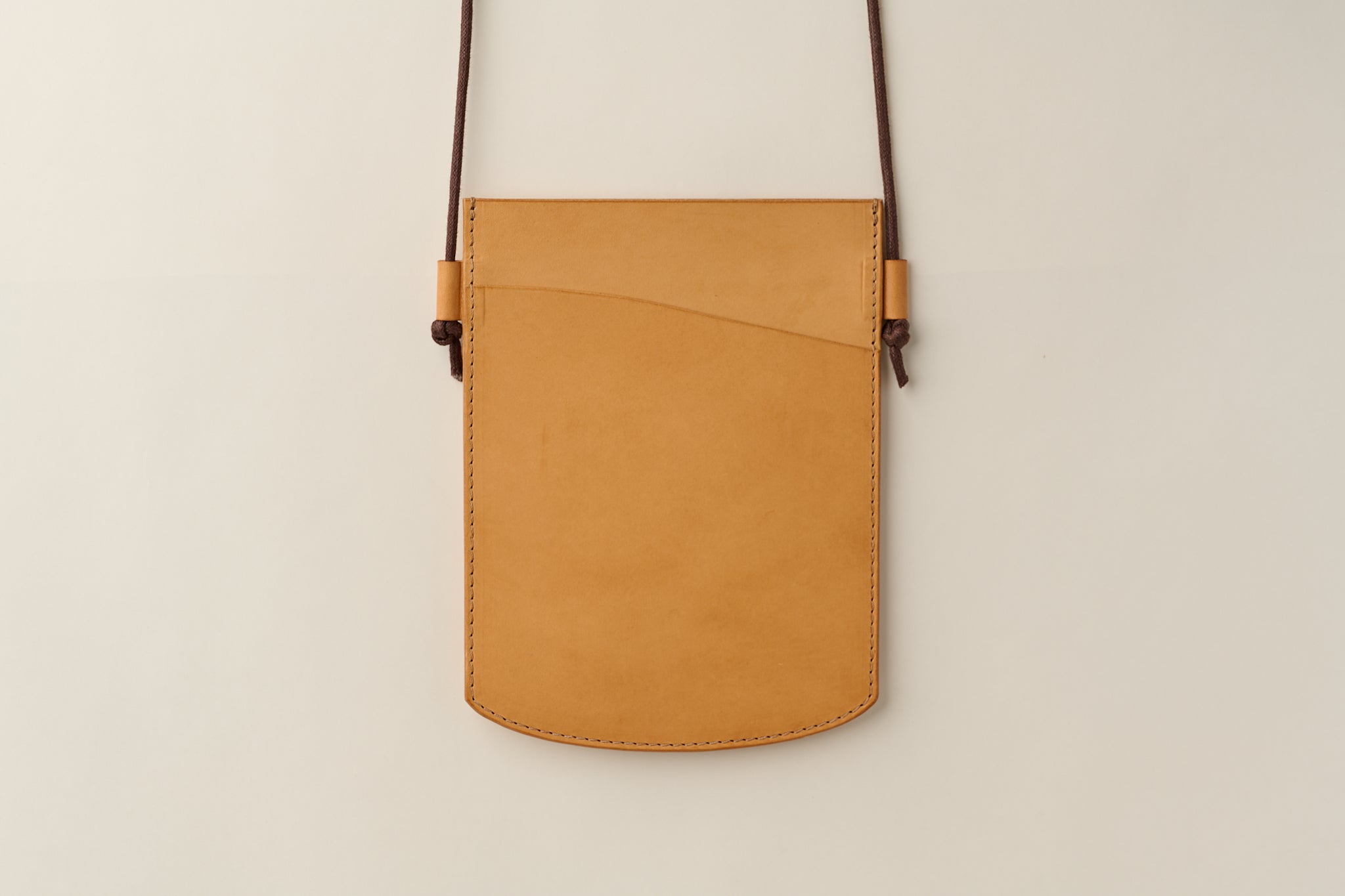 Anya Roux Laverna natural vachetta crossbody pouch.