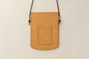 Anya Roux crossbody sleeve natural vachetta.