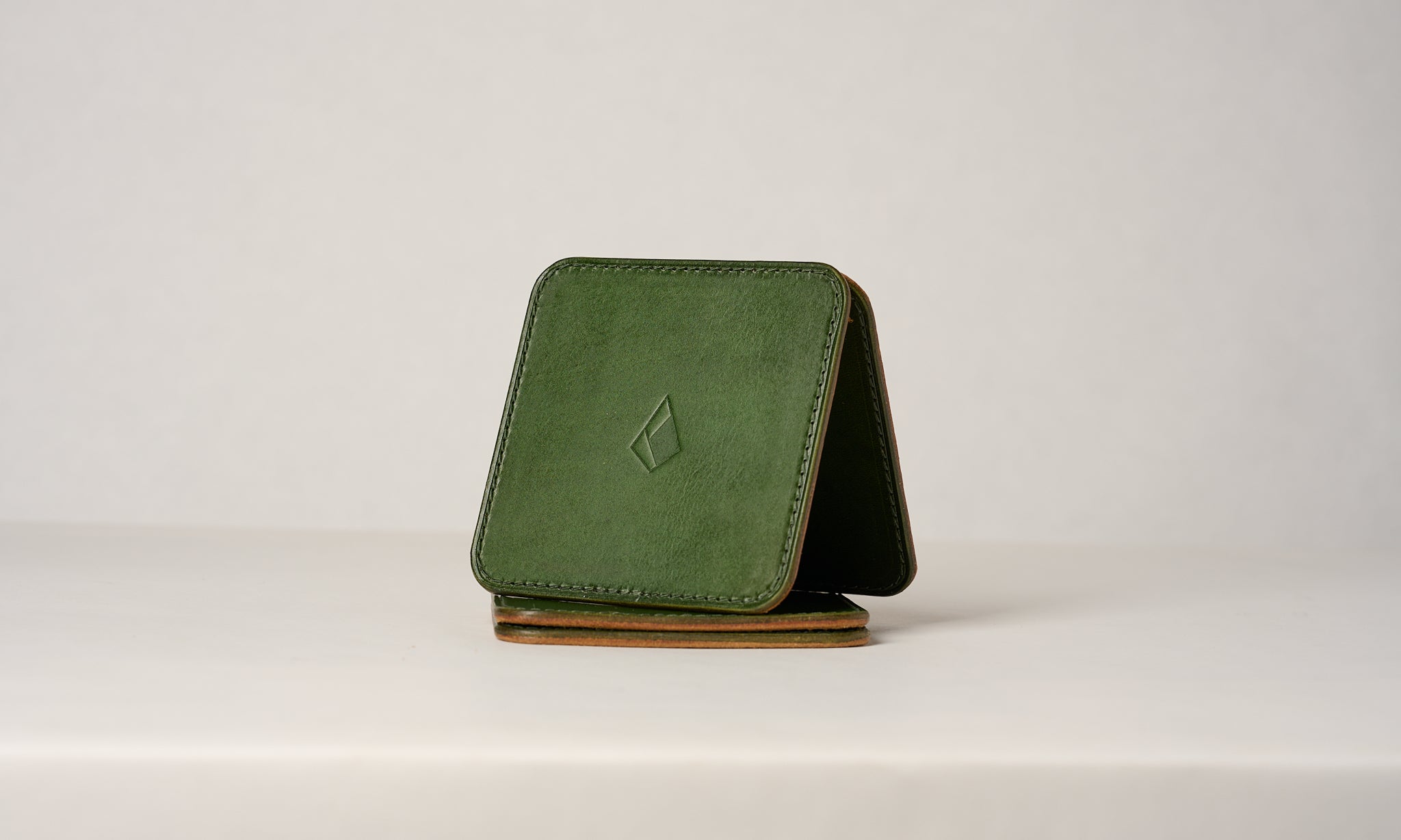 Servi leather coaster set Emerald - Anya Roux