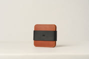 Set of 4 brown leather coasters.